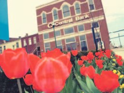 Central Bank Georgetown building with tulips in front
