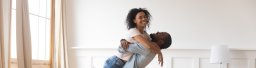 couple embracing in their new home