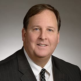 Headshot of Charlie Rush