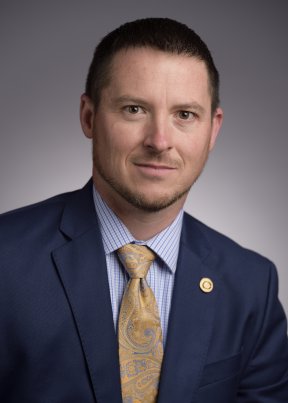 Benjamin Little wearing a blue suit